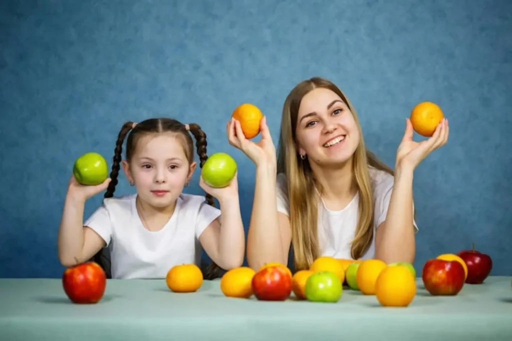 Niña comiendo legumbres y arroz integral – alimentos nutritivos para niños - clinica del crecimiento