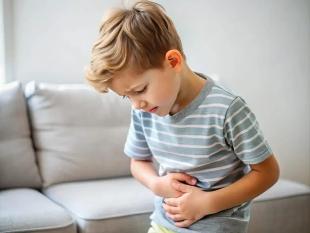Niño con dolor abdominal — síntomas de parásitos intestinales - clinica del crecimiento